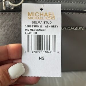 Michael Kors pocket book brand new with tags